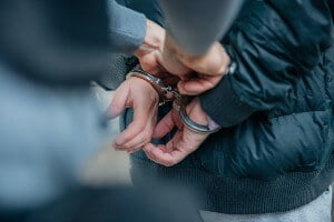 stock image of man being handcuffed