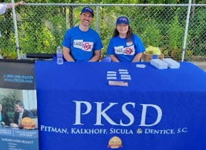 luke and adriana at pksd booth